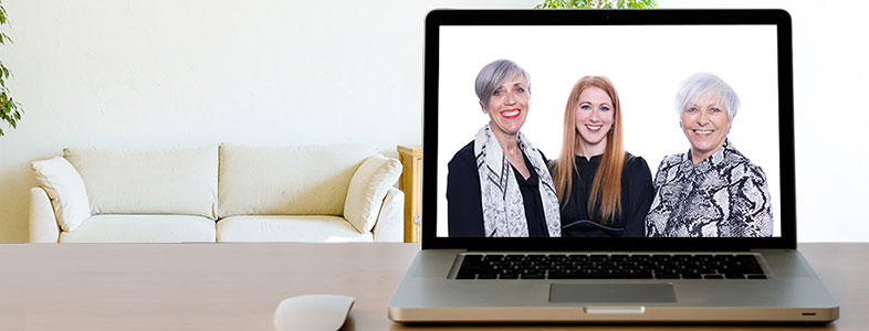 LCC offer online and telephone counselling. Photo of the LLC team on a laptop screen in a clients home helping them get the most of their session.