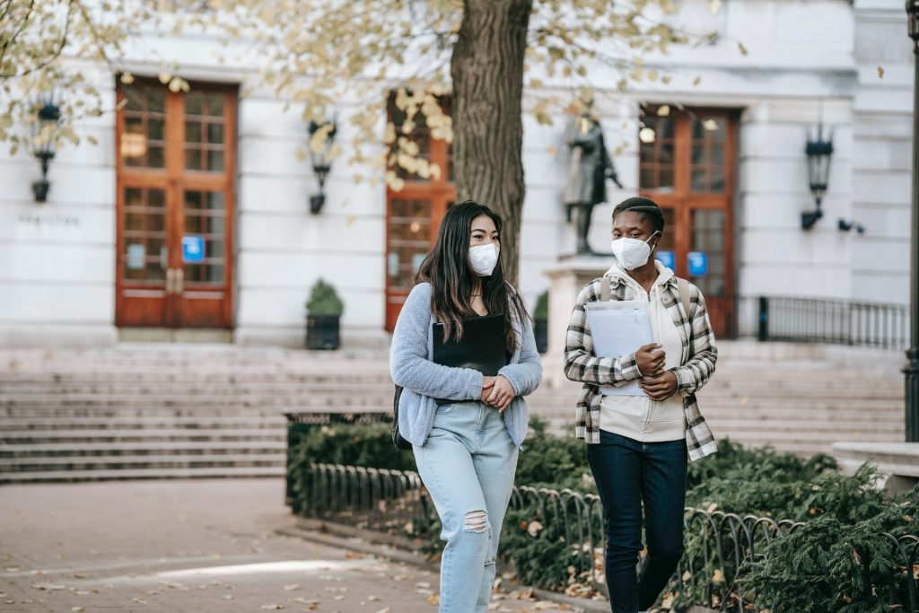 two students attending university during the pandemic