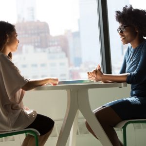 two women in conversation