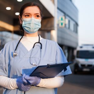nhs worker wearing a mask