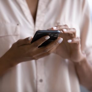 woman texting on her phone